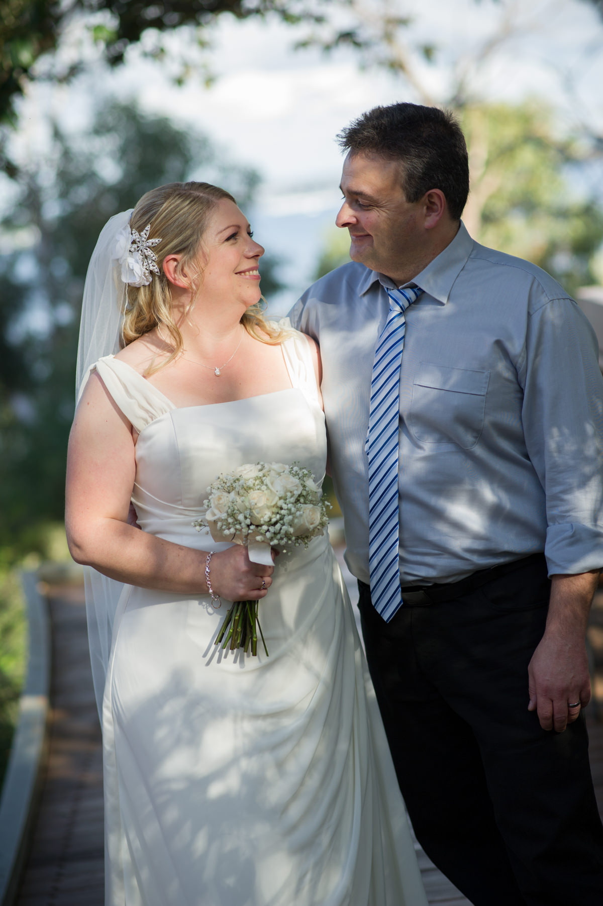 Bride and groom looking at each other in King's Park, Perth