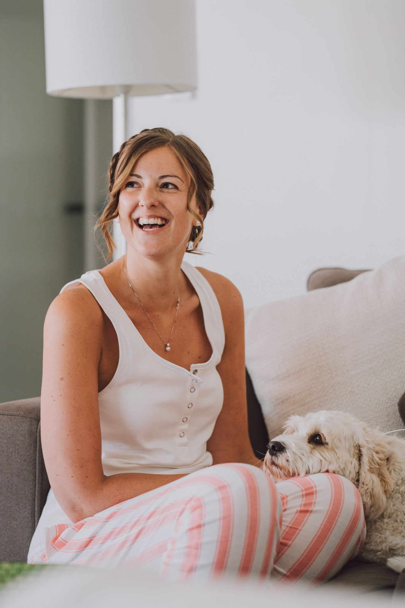 bride laughing in her pyjamas