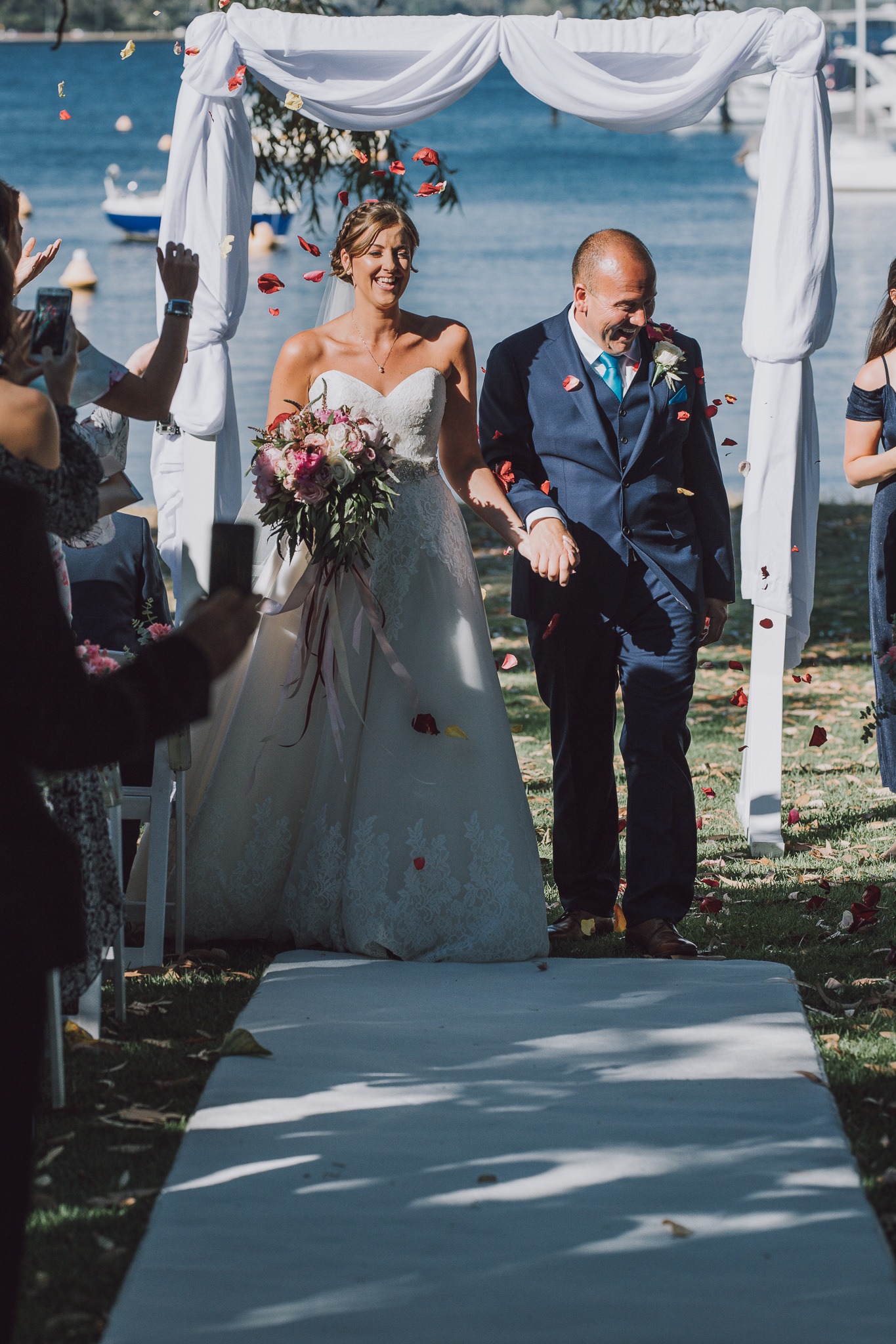 bride and groom walking down the aisle
