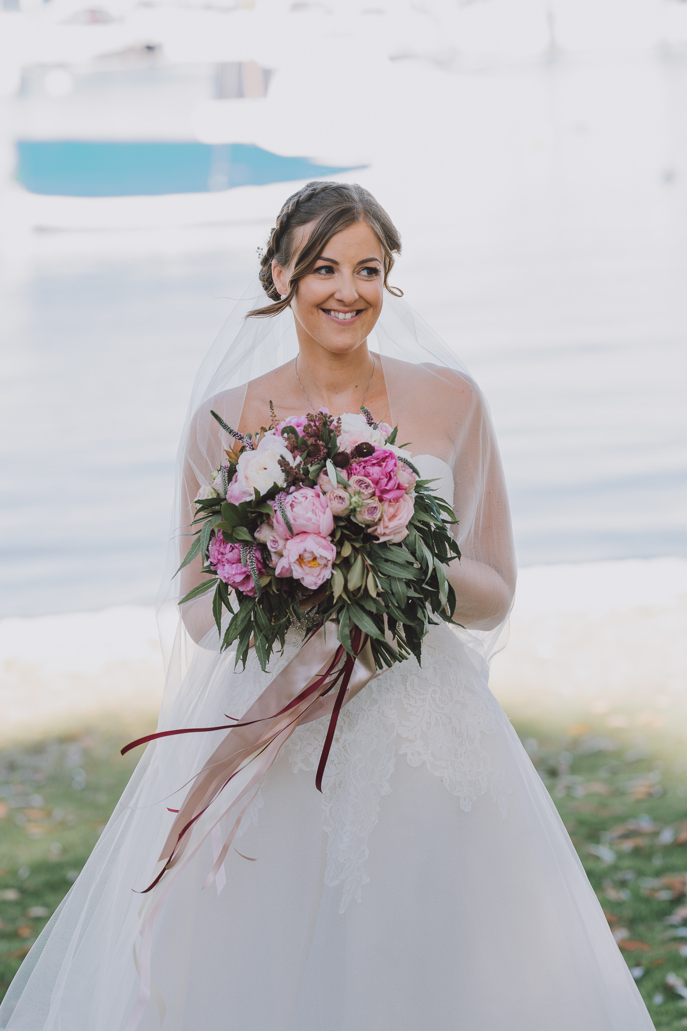 picture of bride holding her bouquet looking away from camera